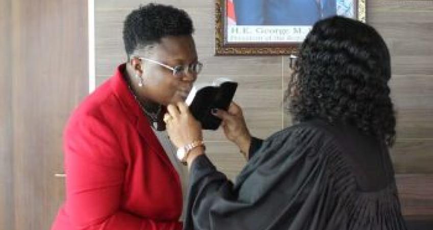 Acting CBL DG for Operations, Madam Pearson taking the oath of office Acting CBL DG for Operations, Madam Pearson taking the oath of office