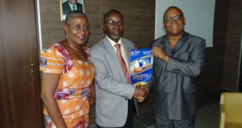 CBL Gov. Weeks receiving a Banner from Visiting Rotary International Executive