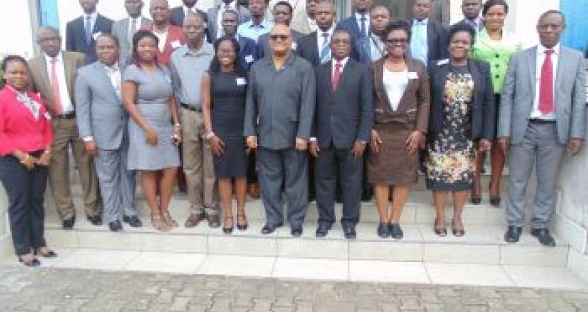 Gov. Weeks (middle) in photo with participants