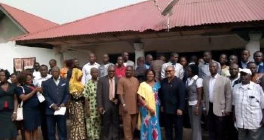 CBL Executive Governor Milton A. Weeks (fourth from right) flanked by managers and board members of rural community finance institutions